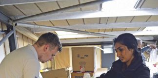 Plymouth charity’s appeal for donations to help refugees OHOB-Volunteers-sifting-and-sorting-and-packing-2