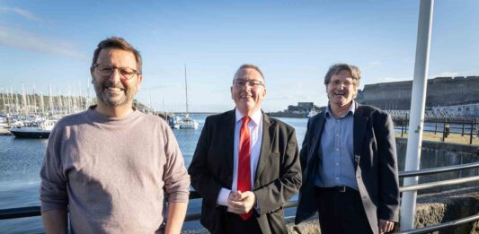 Rockfish’s Mitch Tonks (left) pictured with council leacder Tudor Evans and Roger Maslin, chief executive of the National Marine Aquarium