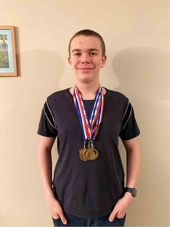 Bradley with his latest haul of Gold Medals Bradley with his latest haul of Gold Medals