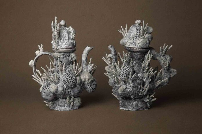 The pair of porcelain vessels created by Morel Doucet The pair of porcelain vessels created by Morel Doucet