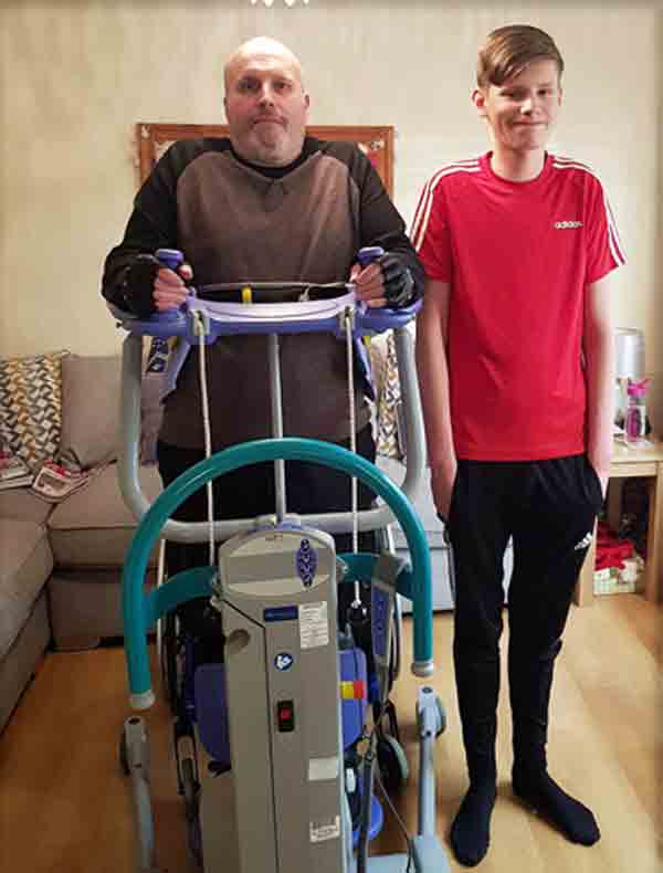 Mike with son Max using his Stand Aid