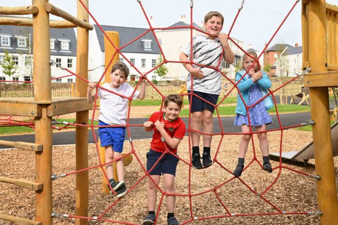 Local youngsters enjoying the new playground at Sherford Local youngsters enjoying the new playground at Sherford