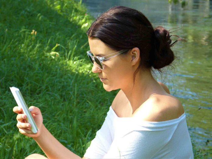 central-park-app Woman using central park app