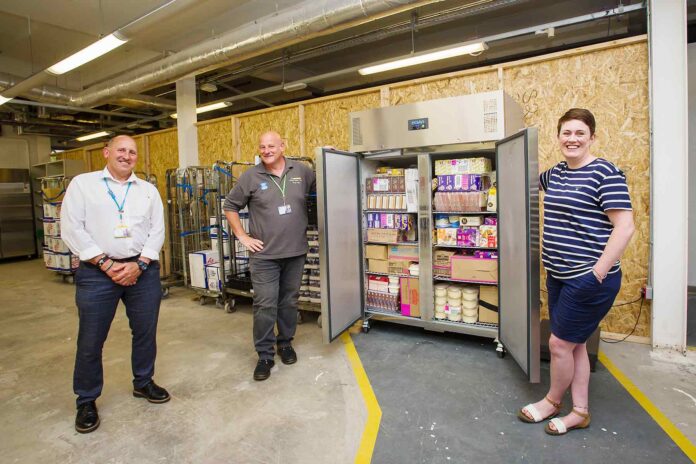 Director of Student Journey Bob Hunter and student liaison officer Chaz Talbot pictured with ARC manager Karena Jolley and the donated fridge/freezer Director of Student Journey Bob Hunter and student liaison officer Chaz Talbot pictured with ARC manager Karena Jolley and the donated fridge/freezer