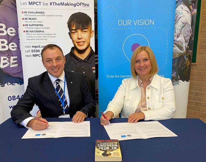 Huw Lewis of the Motivational Preparation College for Training and Jackie Grubb of City College Plymouth Huw Lewis of the Motivational Preparation College for Training and Jackie Grubb of City College Plymouth, sign the Memorandum of Understanding