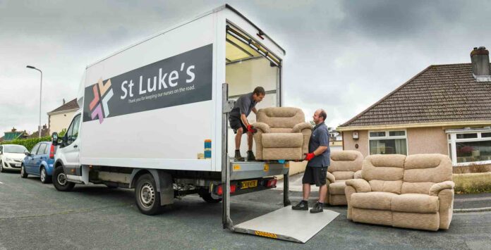 Collecting furniture... St Luke’s Robert Price and Mark Stansbury at work Collecting furniture... St Luke’s Robert Price and Mark Stansbury at work