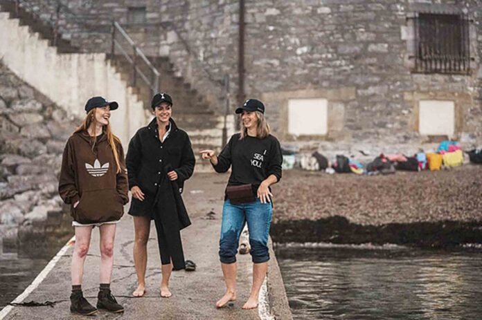Millie Jenkinson (left) pictured during her work experience at swimwear company Millie Jenkinson (left) pictured during her work experience at swimwear company