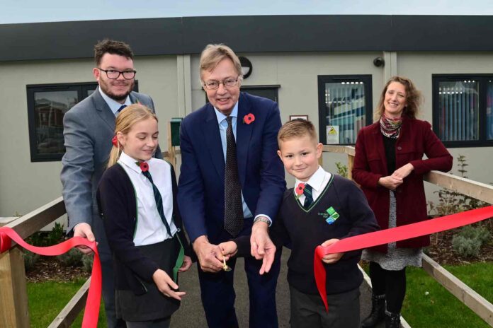 Sir Gary Streeter MP officially opens the new community hub accompanied by Cllr Dan Brown and Judy Talbot, co-ordinator of the Sherford Community Trust and Sherford Vale School pupils Sophia and Harry Sir Gary Streeter MP officially opens the new community hub accompanied by Cllr Dan Brown and Judy Talbot, co-ordinator of the Sherford Community Trust and Sherford Vale School pupils Sophia and Harry