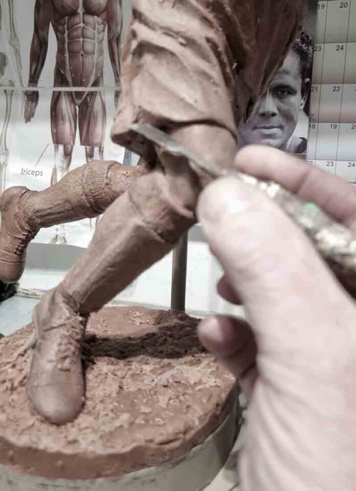 Sculptor Andy Edwards is working on a scale model of the statue Sculptor Andy Edwards is working on a scale model of the statue