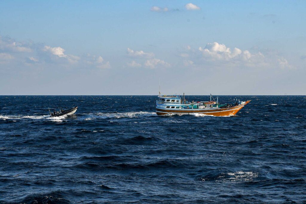 The Royal Marines boarding party chase down the drug- vessel
