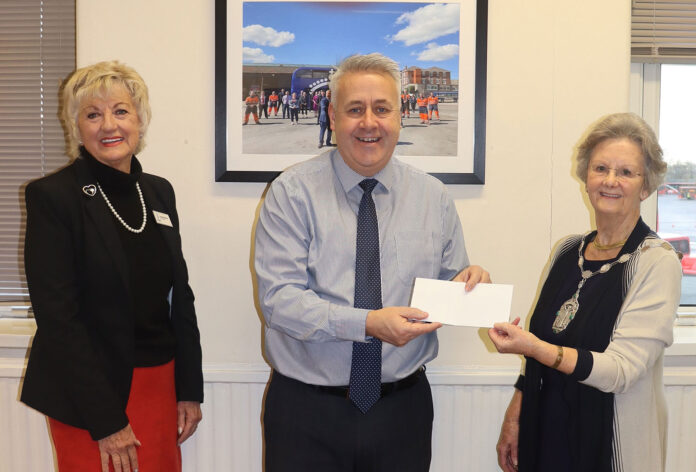 Richard Stevens makes thepresentation to Mary McNaughton Richard Stevens makes the presentation to Mary McNaughton