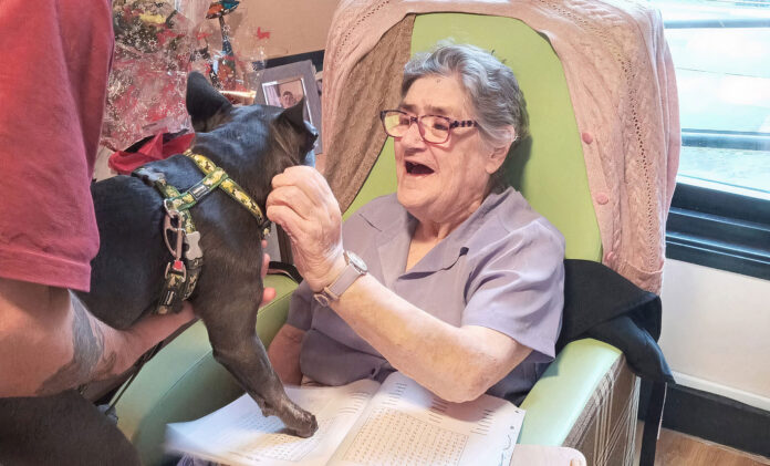 Dudley with resident Lucy Moore Dudley with resident Lucy Moore