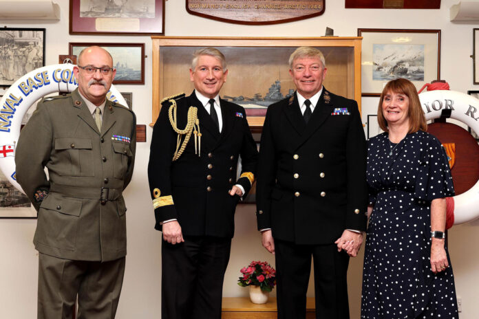 CPO Rob Envy with his wife Irene, Cdre Peter Coulson and Warrant Officer Lee Carr (left) CPO Rob Envy with his wife Irene, Cdre Peter Coulson and Warrant Officer Lee Carr (left)