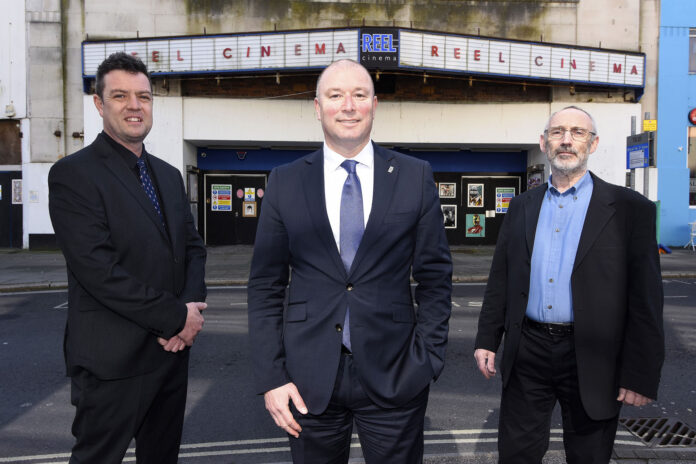 Councillor Nick Kelly pictured with Will Furze (left) and Chris Morgan Giles whose company are leasing the Reel Cinema Councillor Nick Kelly pictured with Will Furze (left) and Chris Morgan Giles whose company are leasing the Reel Cinema