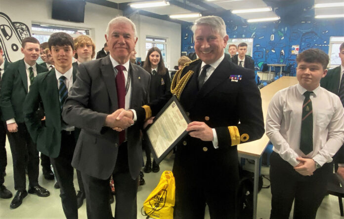 Kevin receives the Commendation from Cdre Peter Coulson Kevin receives the Commendation from Cdre Peter Coulson
