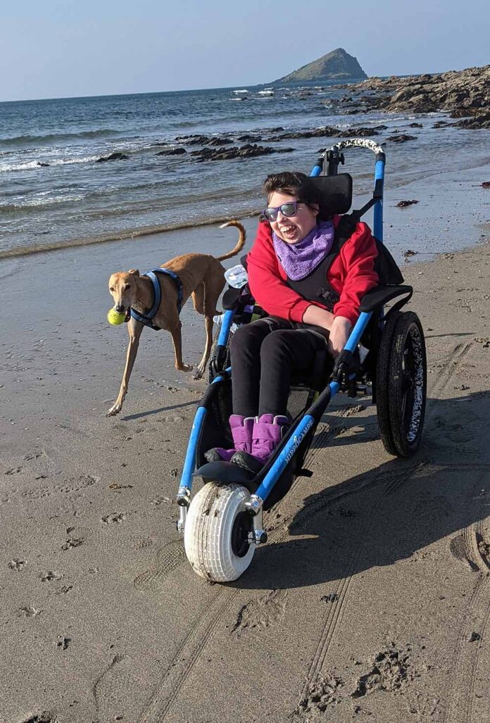 Grace Butland...loves the beach wheelchair Grace Butland...loves the beach wheelchair