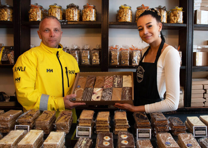 Coxswain Simon Jeffery with Flapjackery’s shop manager Grace Coxswain Simon Jeffery with Flapjackery’s shop manager Grace