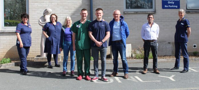 Tom Rowe with his brother Dr James Rowe, and members of his family and NICU staff Tom Rowe with his brother Dr James Rowe, and members of his family and NICU staff