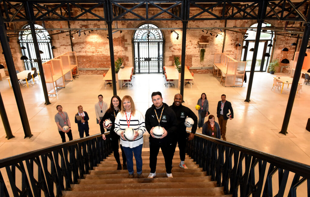Lindsey Hall of Real Ideas and Dan Hart of Argyle Community Trust pictured with colleagues at Devonport’s Market Hall