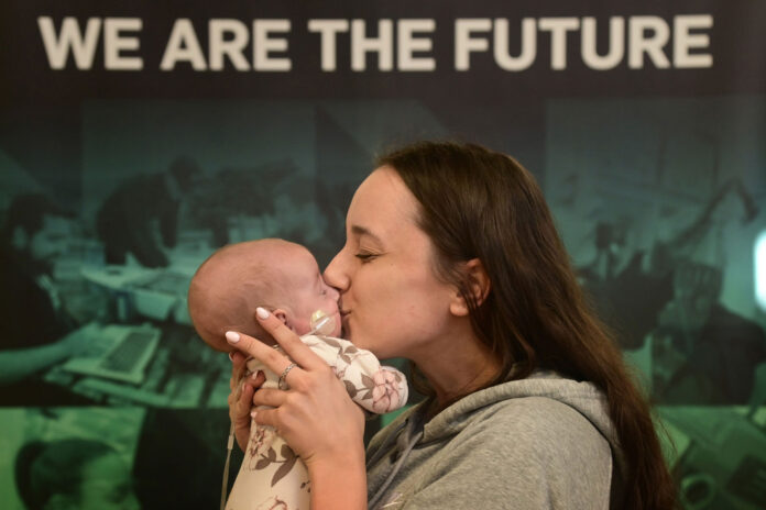 Esme Belcher with baby Evelynn-Rose Esme Belcher with baby Evelynn-Rose at City College Plymouth