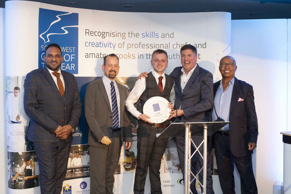 Joe Cotton receiving his award