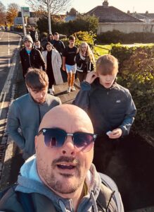 Barefoot professional youth worker Jon Dingle and the SpaceShot Whitleigh young people on their way to the Council House.