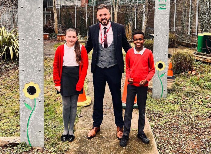 PilkingtonStPeters1 Jon Pilkington pictured with youngsters in the school’s outdoor space