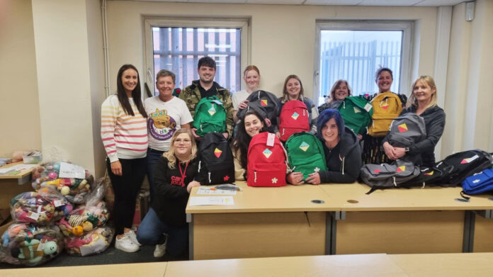 Bags of comfort Care experienced young people and staff from Plymouth Care Journeys and Plymouth Council with Buddybags CEO Karen Williams (second from left)