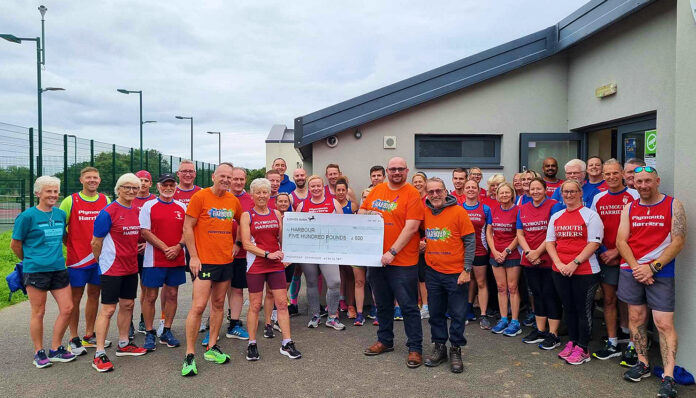 Harriers cheque presentation to harbour - Plymouth Harriers