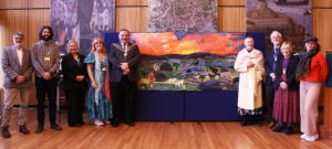 Pictured in front of the mural at Plymouth Council House (from left): Retired City College lecturer Chris Little, Skills Development programme manager Michael Dugdale, City College Plymouth chief executive, Jackie Grubb, lecturer for Learning Difficulties and Disabilities Sue Evans, Lord Mayor of Plymouth Mark Shayer, chairman of the Arts Society South Devon Jane Howlett, Deputy Lord Mayor Kathy Watkin and Consort, Councillor Zoe Reilly