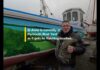 Artist Kevin Preston’s latest mural shows Plymouth Sound in panoramic landscape Video an artist in front of a boat with a painted mural