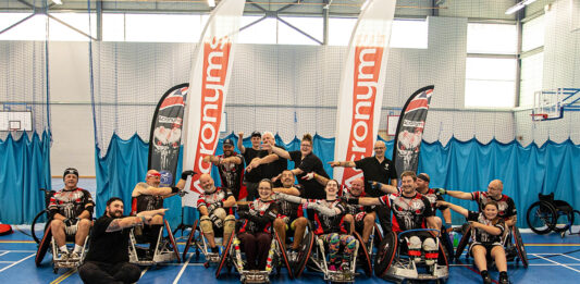 Members of the Team Endeavour Wheelchair Rugby Club celebrating the Morrisons donation.