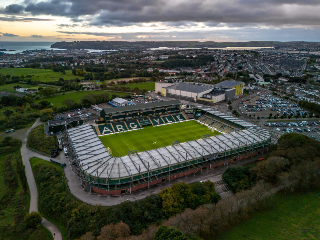 Plymouth, UK , October 09th 2024 Plymouth Argyle Stadium an aerial view from drone, overcast, sunset Plymouth, UK , October 09th 2024 Plymouth Argyle Stadium an aerial view from drone, overcast, sunset - Artur - stock.adobe.com